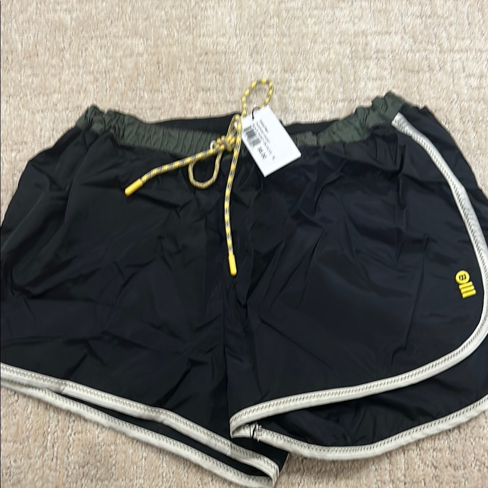 NWT bandier& solid and striped nylon black and white striped jogging shorts